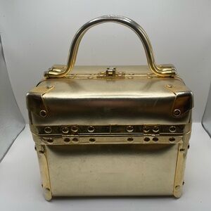 Gold leather hand bag box style